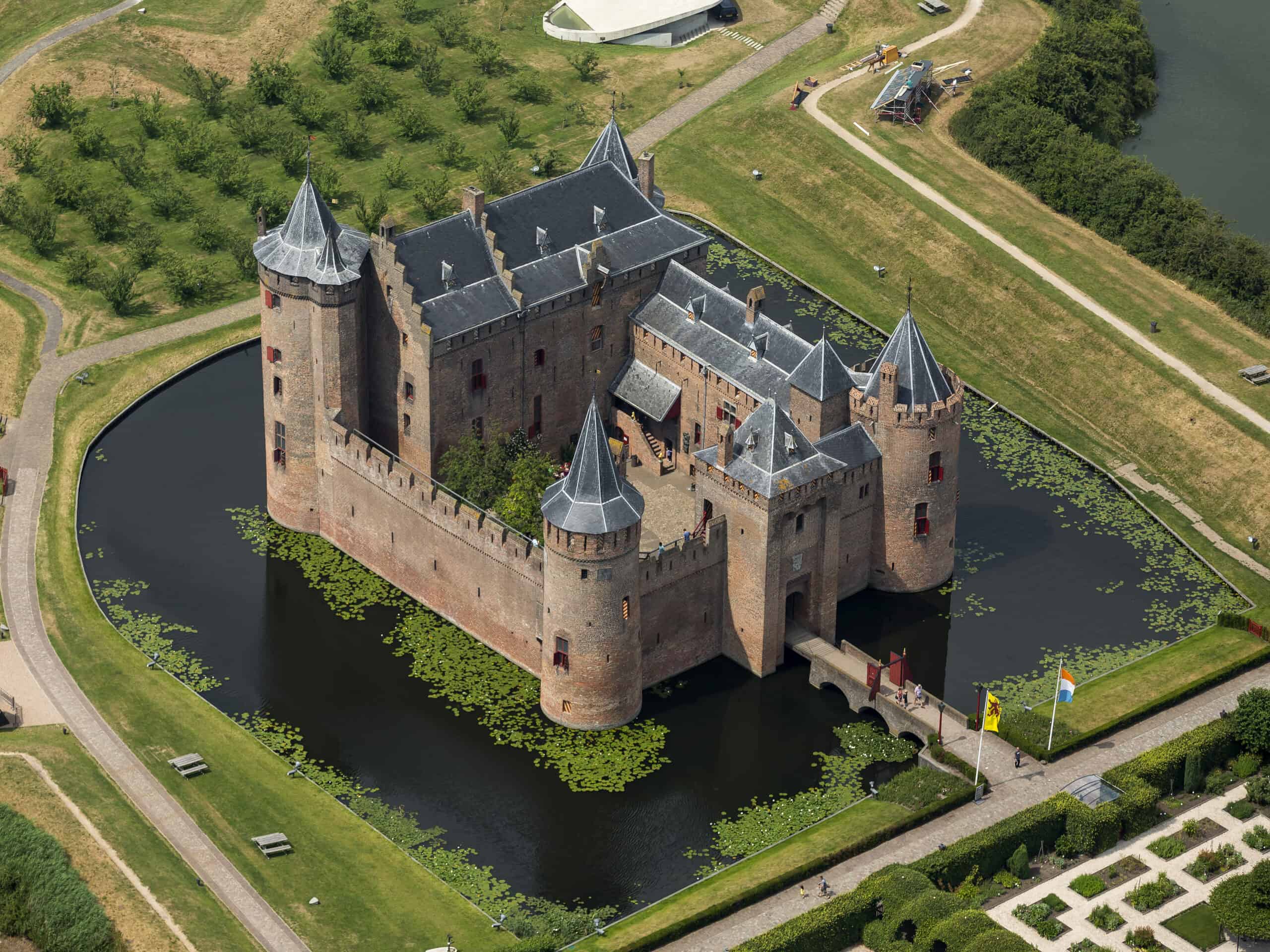 A castle with multiple layers of protection, including a moat.