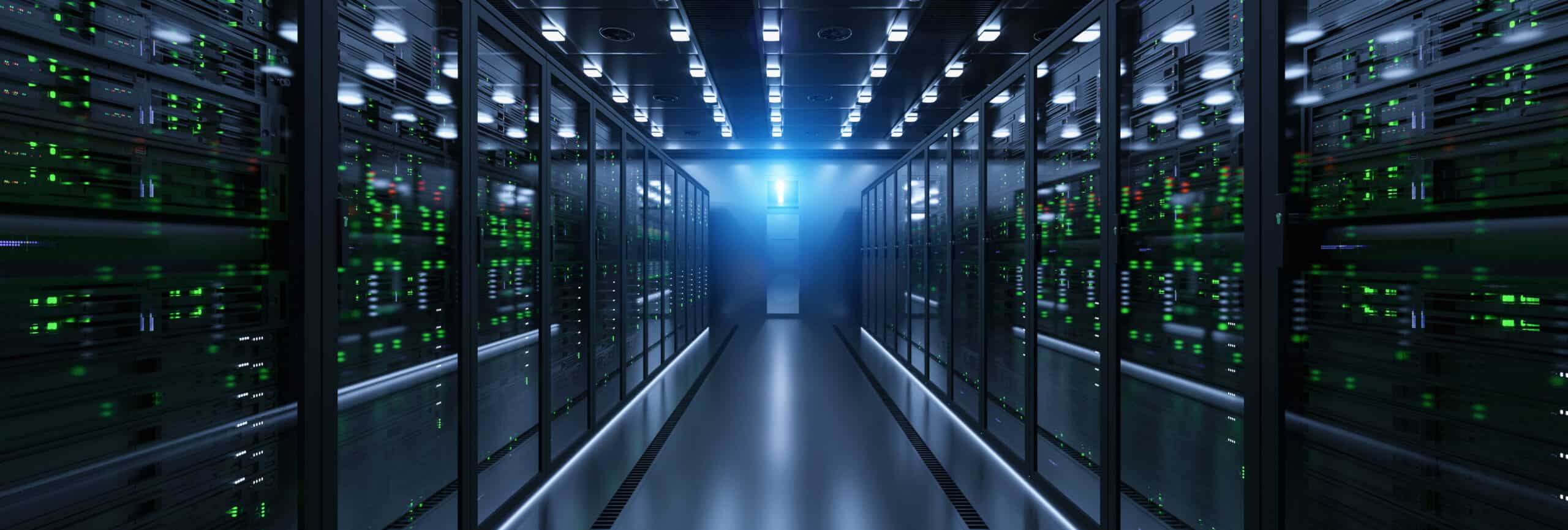 A long hallway of servers at a cloud service data center.